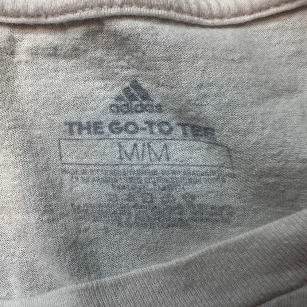 adidas shown neck near